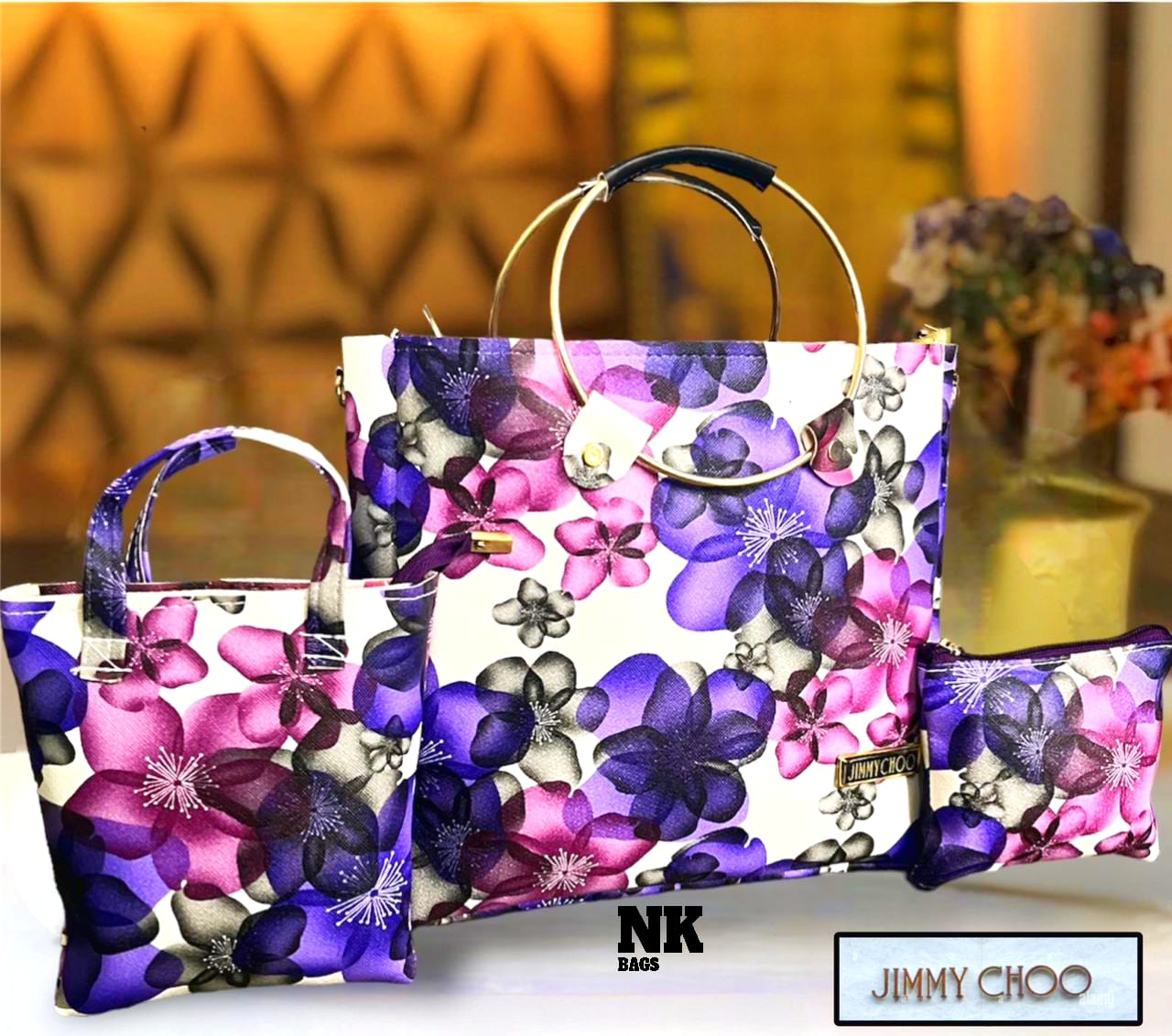 1030A. JIMMY CHOO purse, 3 pc combo, Round steel dual handle, flowery printed. Size