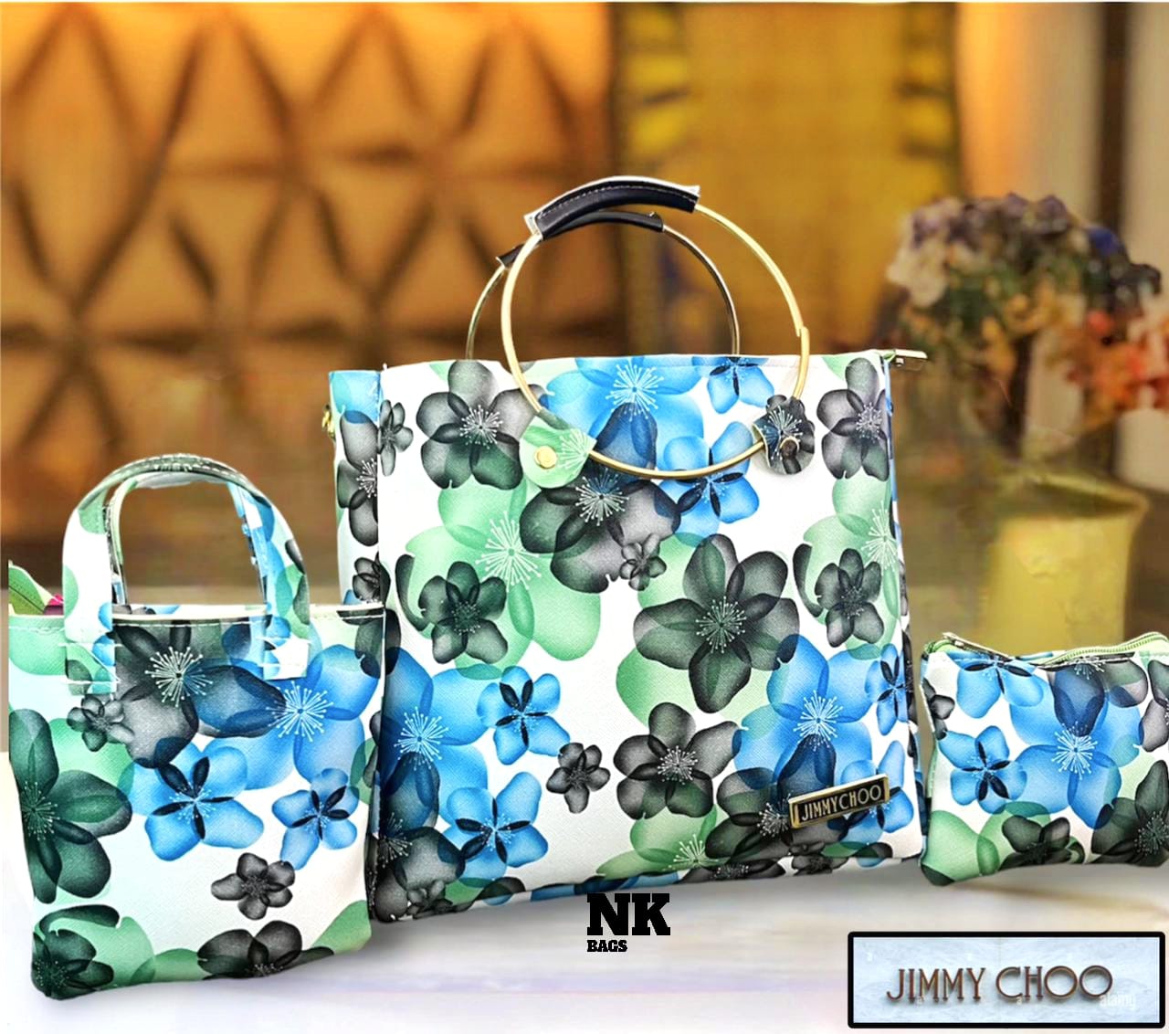 1030D. JIMMY CHOO purse, 3 pc combo, Round steel dual handle, flowery printed. Size